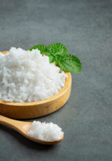 salt in wooden small plate salt in wooden small plate